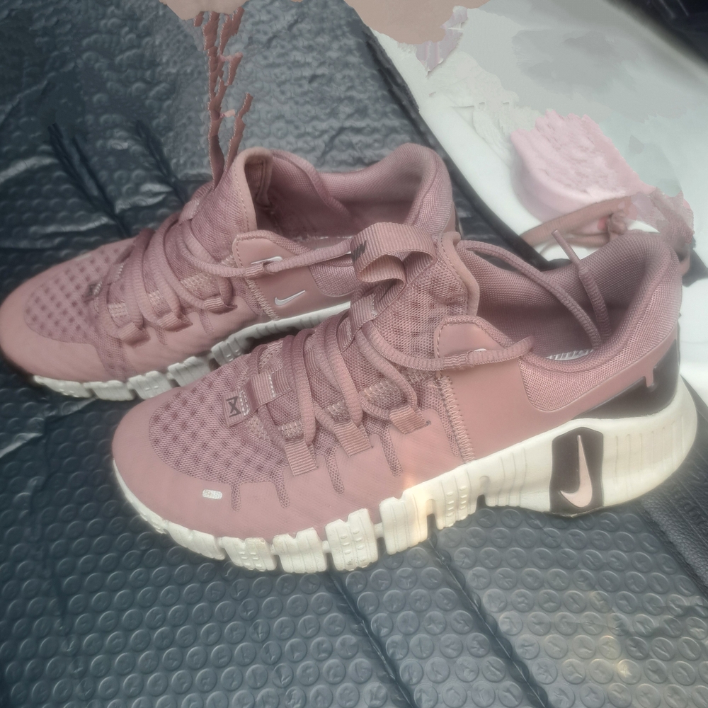 Nike Pink Athletic Shoes with Mesh Upper and Flexible Outsole